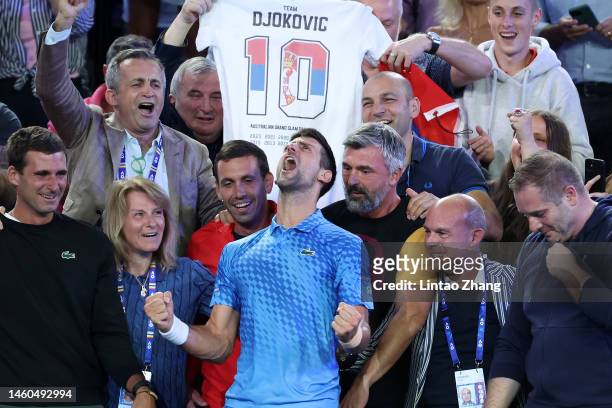 Novak Djokovic of Serbia celebrates winning championship point with Dijana Djokovic, Goran Ivanisevic and his player box in the Men’s Singles Final...