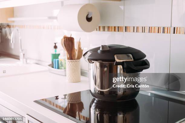 high pressure pot in kitchen - pressure cooker stock pictures, royalty-free photos & images