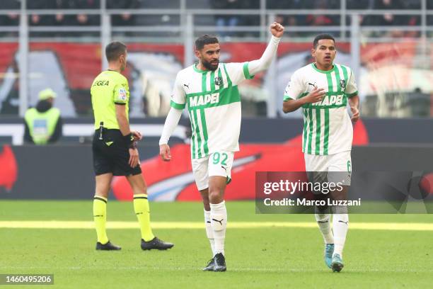 Gregoire Defrel of US Sassuolo celebrates with teammates after scoring the team's first goal during the Serie A match between AC MIlan and US...