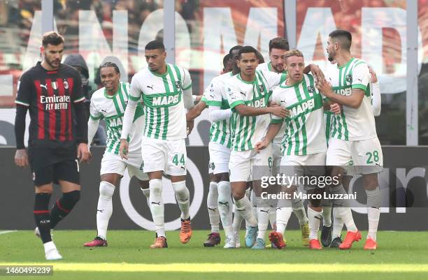 Davide Frattesi of US Sassuolo celebrates with teammates after scoring the team's second goal during the Serie A match between AC MIlan and US...