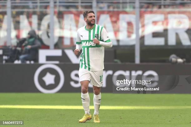 Domenico Berardi of US Sassuolo celebrates after scoring the team's third goal during the Serie A match between AC MIlan and US Sassuolo at Stadio...