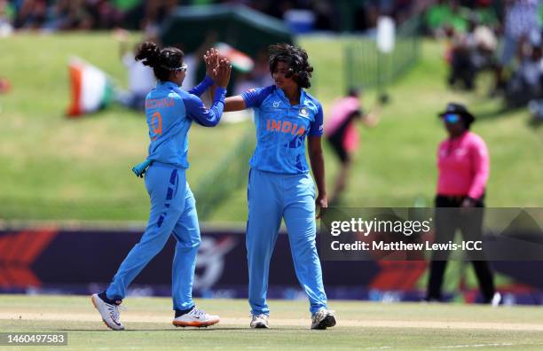 Titas Sadhu of India celebrates the wicket of Seren Smale of England with team mate Archana Devi during the ICC Women's U19 T20 World Cup 2023 Final...