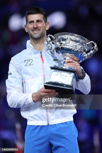 Novak Djokovic of Serbia poses with the Norman Brookes Challenge Cup after winning the Men's Singles Final match against Stefanos Tsitsipas of Greece...