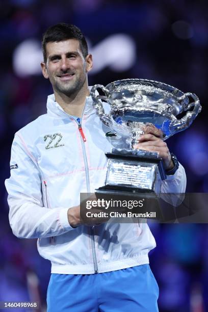 Novak Djokovic of Serbia poses with the Norman Brookes Challenge Cup after winning the Men's Singles Final match against Stefanos Tsitsipas of Greece...