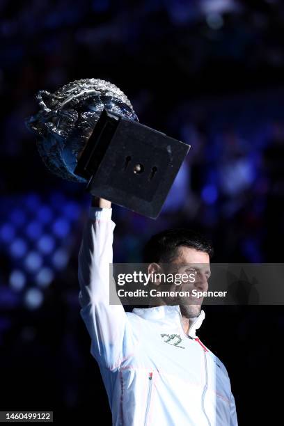 Novak Djokovic of Serbia poses with the Norman Brookes Challenge Cup after winning the Men's Singles Final match against Stefanos Tsitsipas of Greece...