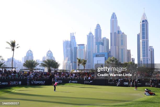 Rory McIlroy of Northern Ireland putts on the 16th green during the Third Round on Day Four of the Hero Dubai Desert Classic at Emirates Golf Club on...