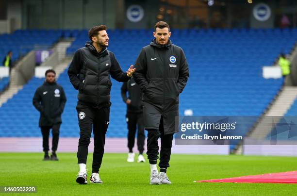 Adam Lallana of Brighton & Hove Albion inspects the pitch prior to the Emirates FA Cup Fourth Round match between Brighton & Hove Albion and...