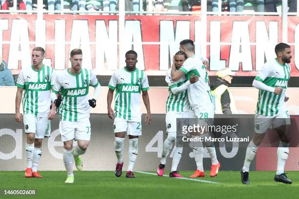 Armand Lauriente of US Sassuolo celebrates with teammates after scoring the team's fourth goal during the Serie A match between AC MIlan and US...