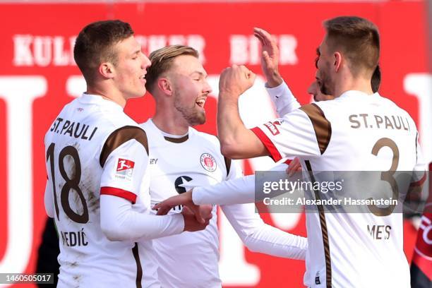 Jakov Medic of St. Pauli celebrates scoring the opening goal with his team mates during the Second Bundesliga match between 1. FC Nürnberg and FC St....