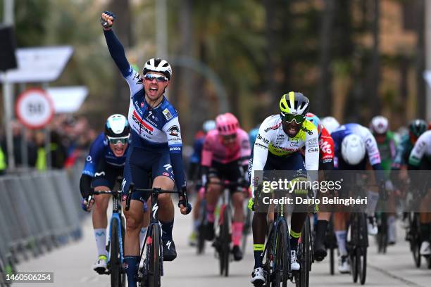 Ethan Vernon of The United Kingdom and Team Soudal-Quick Step celebrates at finish line as race winner ahead of Biniam Girmay of Eritrea and Team...