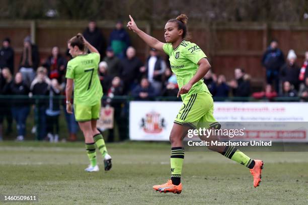 Nikita Parris of Manchester United celebrates after scoring the team's first goal during the Vitality Women's FA Cup Fourth Round match between...