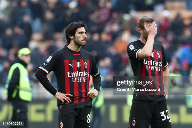 Sandro Tonali and Tommaso Pobega of AC Milan looks dejected following the team's defeat during the Serie A match between AC MIlan and US Sassuolo at...