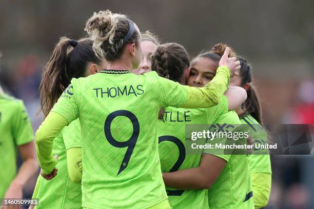 Nikita Parris of Manchester United celebrates with teammates after scoring the team's first goal during the Vitality Women's FA Cup Fourth Round...