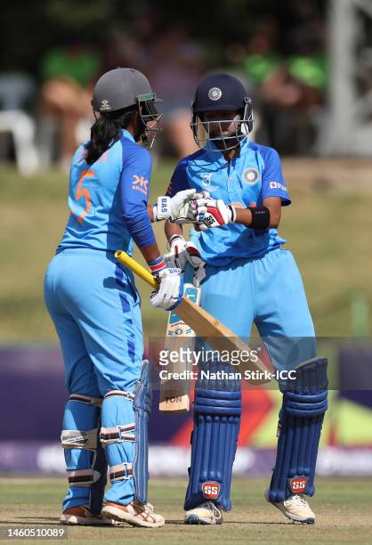 Soumya Tiwari and G Trisha of India embrace during the ICC Women's U19 T20 World Cup 2023 Final match between India and England at JB Marks Oval on...