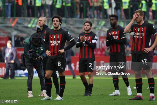 Milan players react after losing the Serie A match between AC MIlan and US Sassuolo at Stadio Giuseppe Meazza on January 29, 2023 in Milan, Italy.