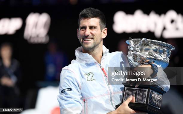 Novak Djokovic of Serbia poses with the Norman Brookes Challenge Cup after winning the Men's Singles Final match against Stefanos Tsitsipas of Greece...