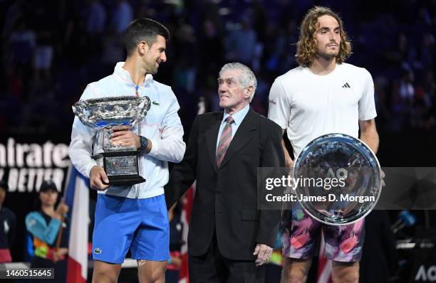 Novak Djokovic of Serbia poses with the Norman Brookes Challenge Cup alongside Stefanos Tsitsipas of Greece and Ken Rosewall AM MBE after the Men's...