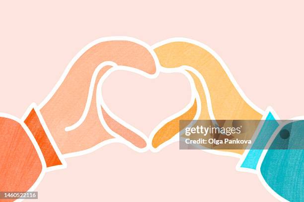 cropped hands of person making heart shape - emoji hands photos et images de collection