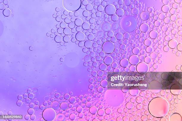 oil drops and bubbles abstract background - oil abundance stock pictures, royalty-free photos & images