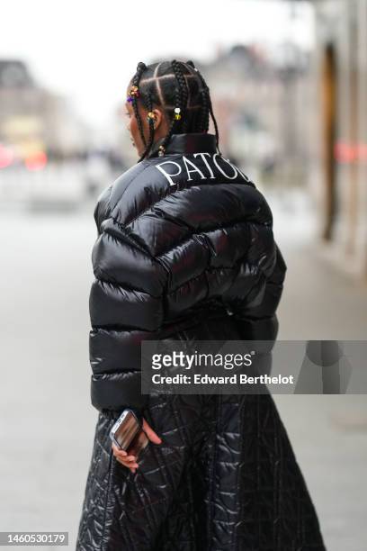 Black Puffer Jacket Photos and Premium High Res Pictures - Getty Images
