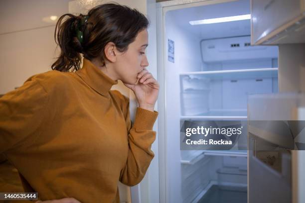 empty fridge - women wearing nothing stock pictures, royalty-free photos & images