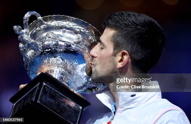 Novak Djokovic of Serbia kisses the Norman Brookes Challenge Cup after winning the Men's Singles Final match against Stefanos Tsitsipas of Greece...
