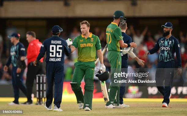 David Miller of South Africa shakes hands with Adil Rashid of England after winning the 2nd One Day International between South Africa and England at...