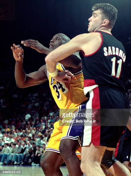 Lakers Shaquille O'Neal battles Trailblazers Arvydas Sabonis during Game 2 action during the NBA Playoff game of Los Angeles Lakers against Portland...