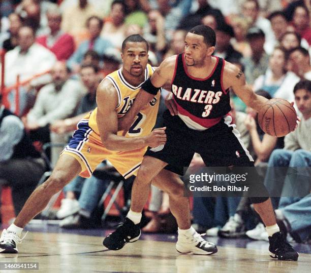 Lakers Derek Fisher guards Trailblazers Damon Stoudamire during Game 2 action during the NBA Playoff game of Los Angeles Lakers against Portland...