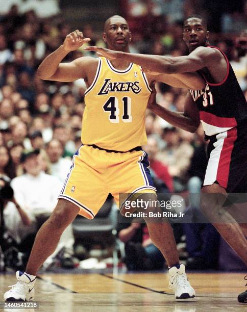 Lakers Elden Campbell battles Trailblazers Kelvin Cato during Game 2 action during the NBA Playoff game of Los Angeles Lakers against Portland...