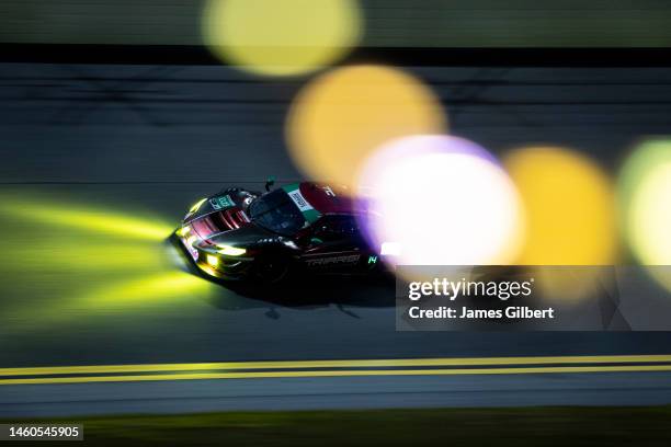 The Triarsi Competizione Ferrari 296 GT3 of Onofrio Triarsi, Charles Scardina, Alessio Rovera, and Andrea Bertolini drives during the Rolex 24 at...