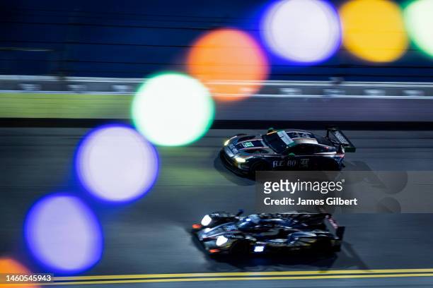 The Magnus Racing Aston Martin Vantage GT3 of John Potter, Andy Lally, Spencer Pumpelly, and Nicki Thiim drives during the Rolex 24 at Daytona...