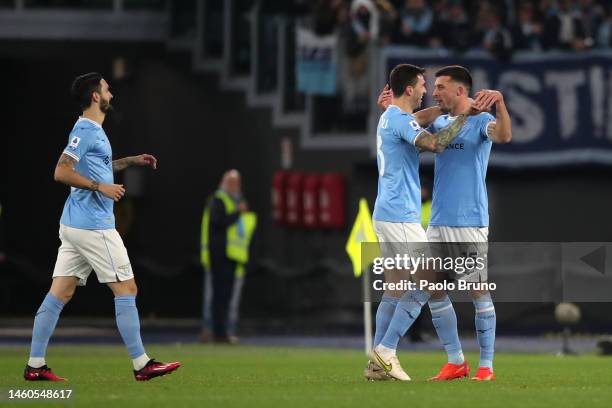 Nicolo Casale of SS Lazio celebrates after scoring the team's first goal with teammates Alessio Romagnoli and Luis Alberto during the Serie A match...