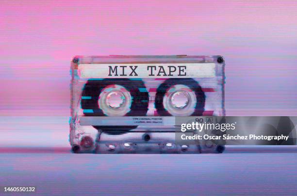 cassette audio tape with glitch vhs effect and mix tape on label - cassette tape stock pictures, royalty-free photos & images