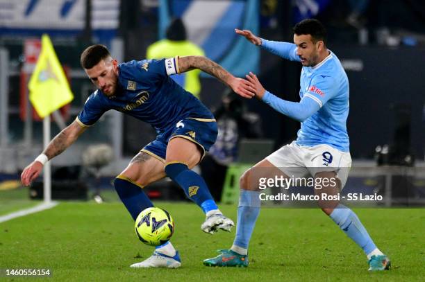 Pedro Rodriguez of SS Lazio compete for the ball with Cristiano Buraghi of ACF Fiorentina during the Serie A match between SS Lazio and ACF...
