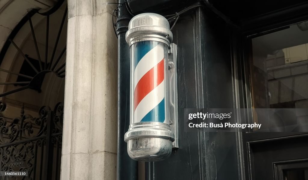 Old-fashioned barber's pole in London, England