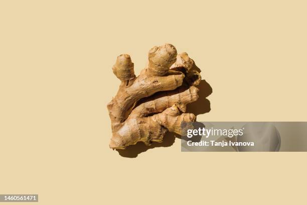 fresh ginger on beige background. flat lay, top view, copy space. - ショウガ ストックフォトと画像