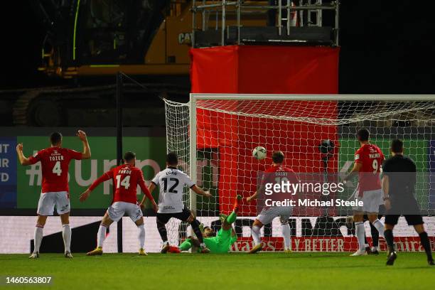 John Egan of Sheffield United scores the team's third goal during the Emirates FA Cup Fourth Round match between Wrexham and Sheffield United at...