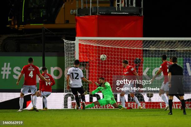 John Egan of Sheffield United scores the team's third goal during the Emirates FA Cup Fourth Round match between Wrexham and Sheffield United at...