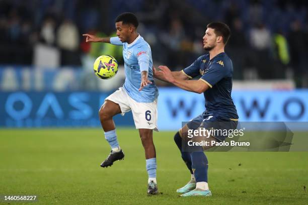 Marcos Antonio of SS Lazio is challenged by Carles Perez of RC Celta during the Serie A match between SS Lazio and ACF Fiorentina at Stadio Olimpico...