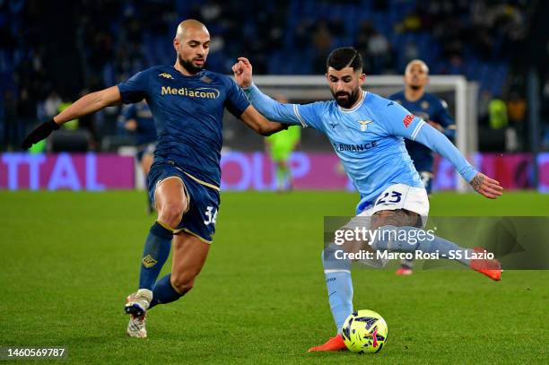 Elseid Hysaj of SS Lazio compete for the ball with Sofyan Ambrabat of ACF Fiorentina during the Serie A match between SS Lazio and ACF Fiorentina at...