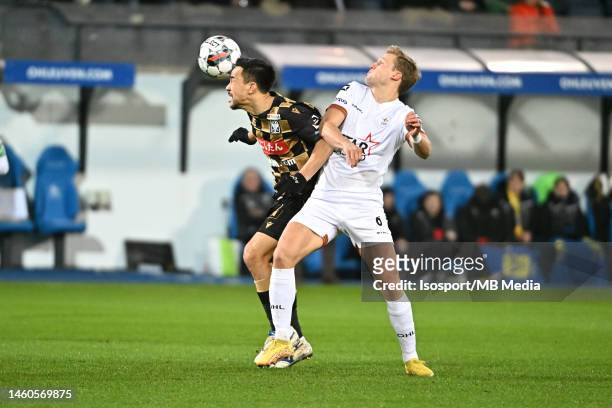 Shinji Okazaki of STVV battles for the ball with Joren Dom of OHL during the Jupiler Pro League season 2022 - 2023 match day 23 between Oud-Heverlee...
