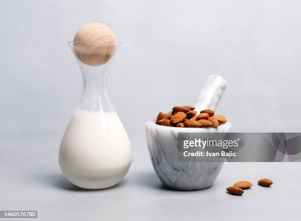 almond milk - almond milk stock pictures, royalty-free photos & images