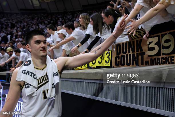 Zach Edey of the Purdue Boilermakers celebrates with fans after a win over the Michigan State Spartans at Mackey Arena on January 29, 2023 in West...