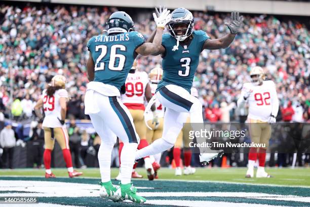 Miles Sanders of the Philadelphia Eagles celebrates with Zach Pascal after scoring a 6 yard touchdown against the San Francisco 49ers during the...