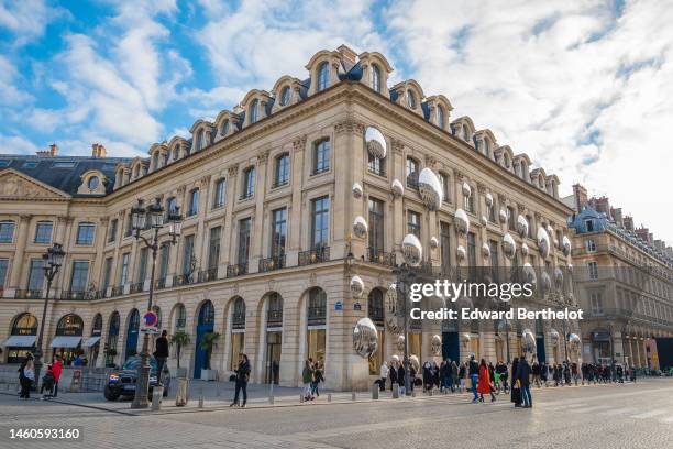 The facade of the Louis Vuitton Store displays a Yayoi Kusama robot and mirrors at Place Vendome on January 29, 2023 in Paris, France.