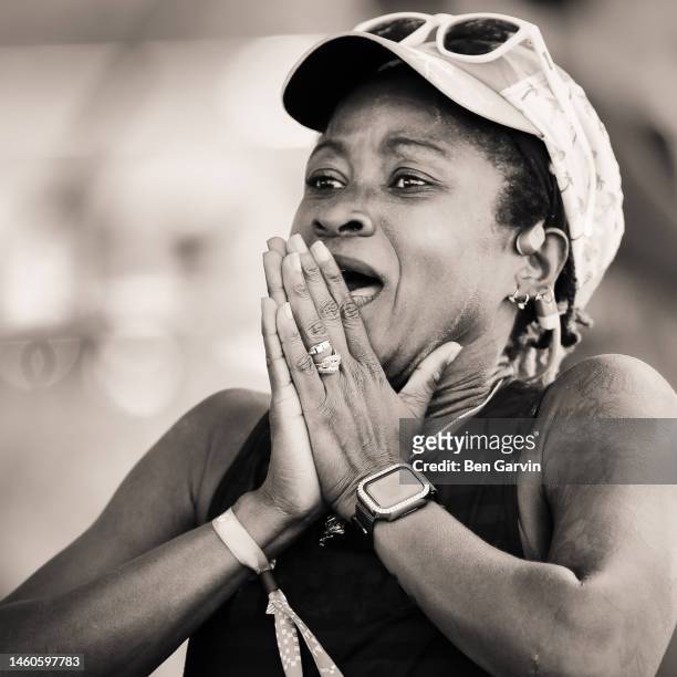 powerful marathon finish line celebration moment - black pants woman fotografías e imágenes de stock