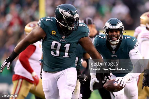 Haason Reddick of the Philadelphia Eagles celebrates with Fletcher Cox after recovering a fumble against the San Francisco 49ers during the second...