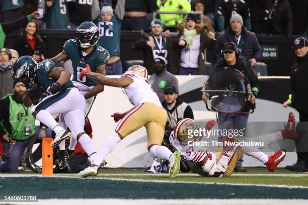 Boston Scott of the Philadelphia Eagles scores a touchdown against the San Francisco 49ers during the second quarter in the NFC Championship Game at...