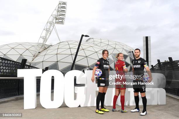 Kayla Morrison of the Melbourne Victory, Isabel Hodgson of Adelaide United and Josh Brillante of the Melbourne Victory pose during a media...